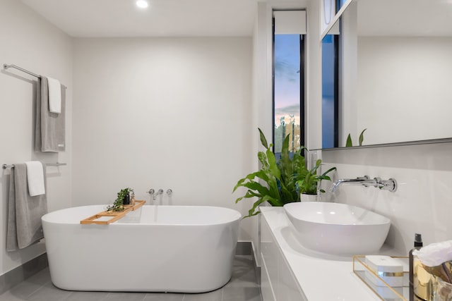 Newly renovated bathroom with a big bathtub and mirror