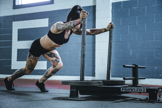 A woman doing workout at a Gym